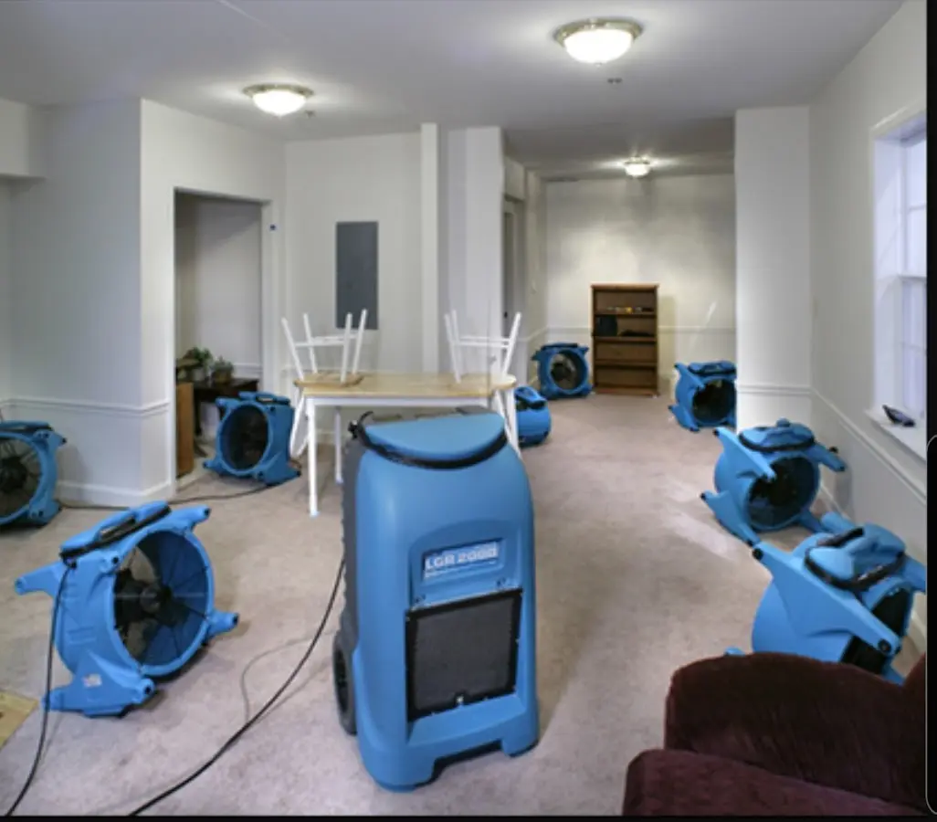 Air movers and dehumidifier setup for Water Damage Restoration in Bel Aire